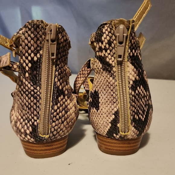 Black and Gold Gladiator Sandals with Metallic Buckles - Picture 2 of 6